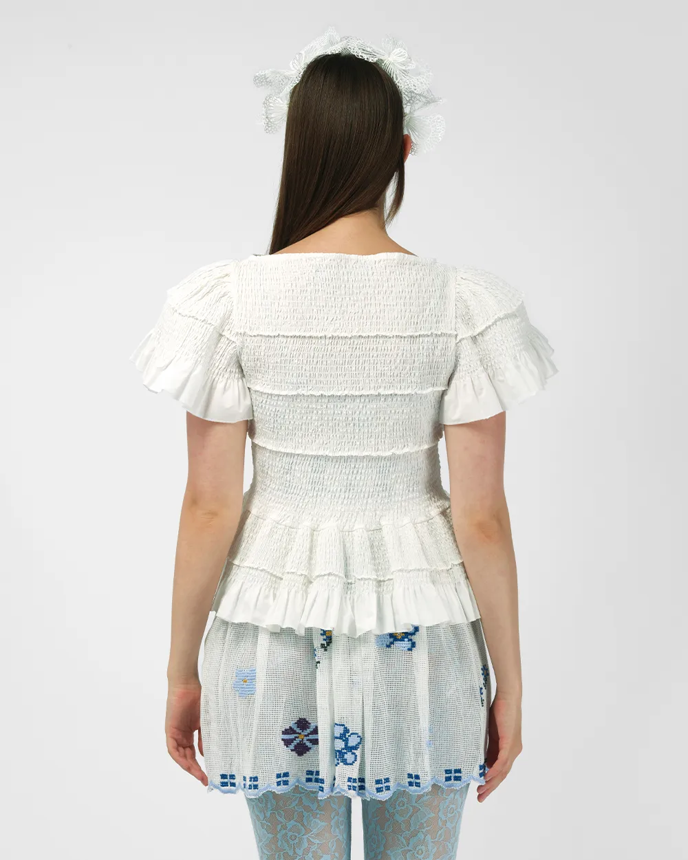 SMOCKED PEPLUM TOP