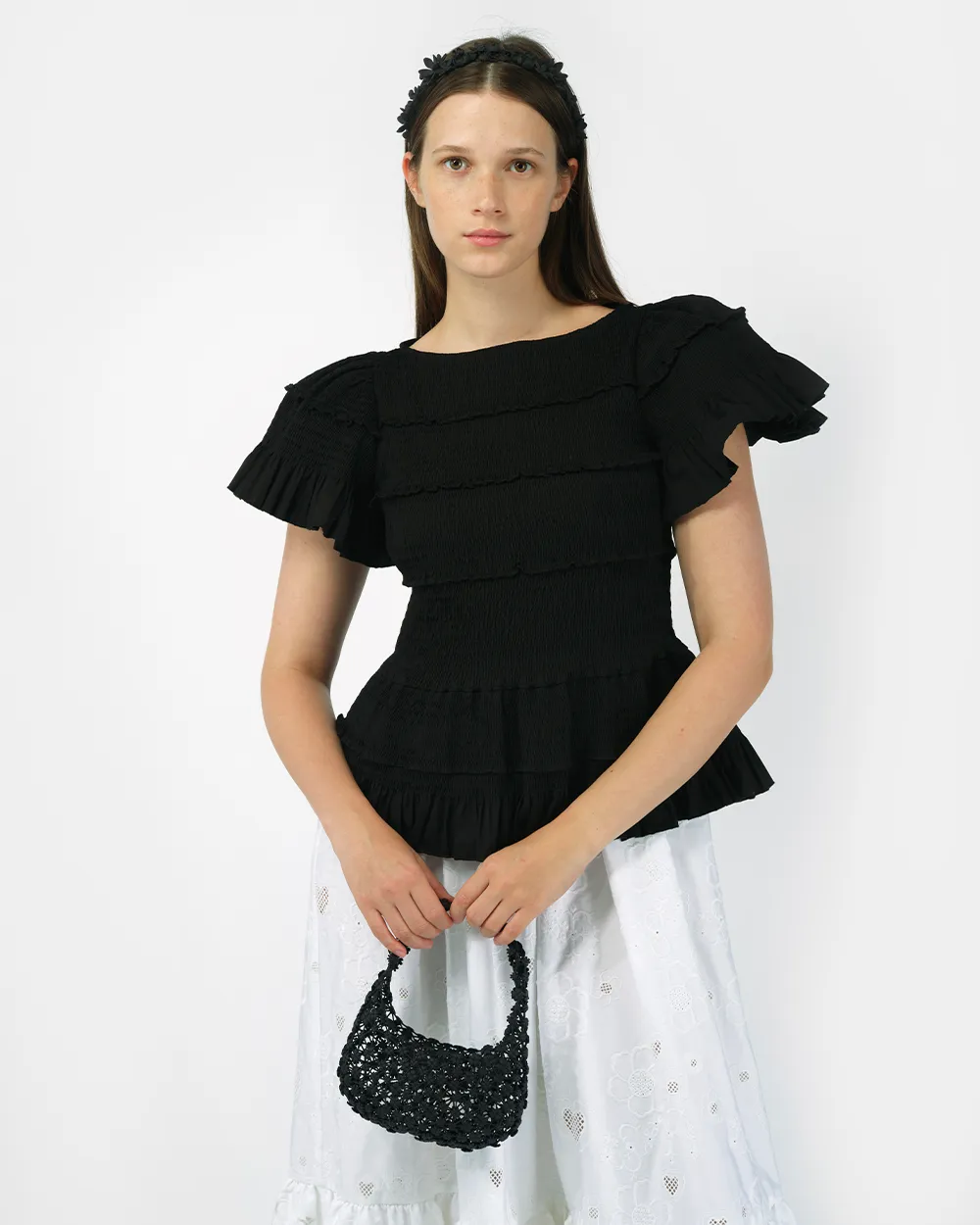 SMOCKED PEPLUM TOP
