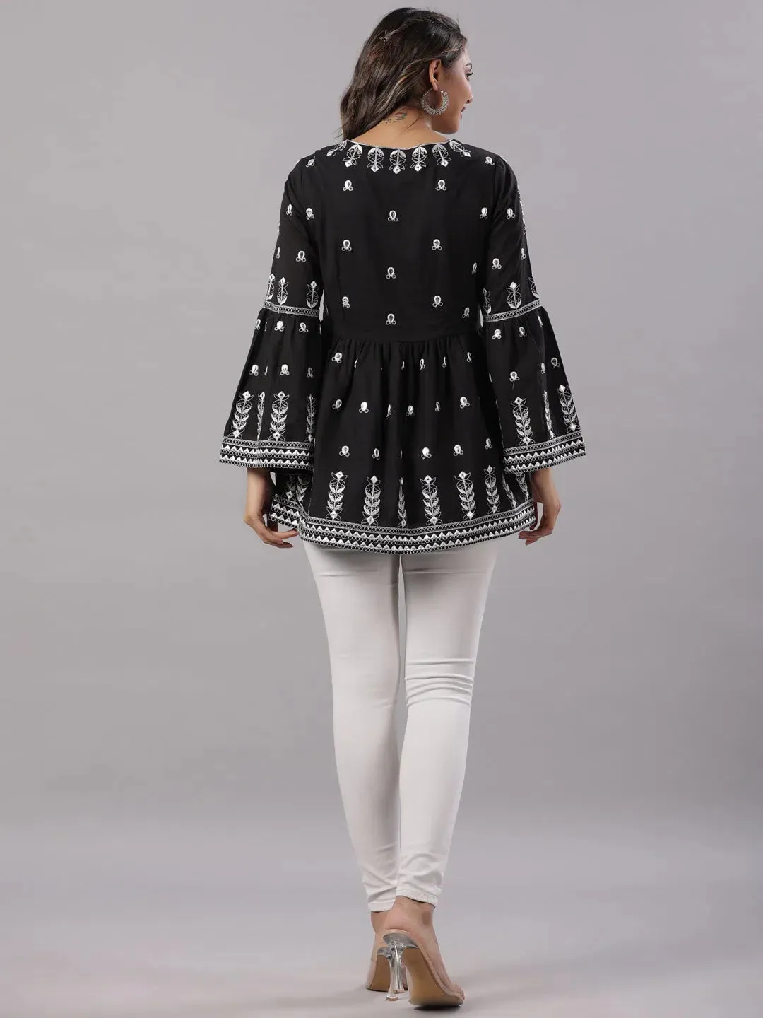 Women Black Cotton Dobby Embroidered Peplum Tunic.