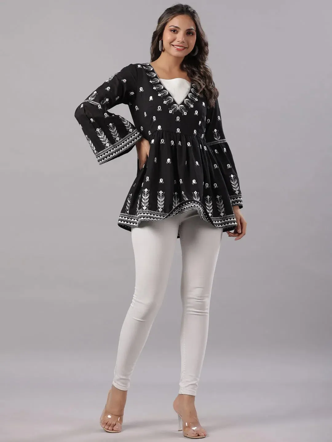 Women Black Cotton Dobby Embroidered Peplum Tunic.